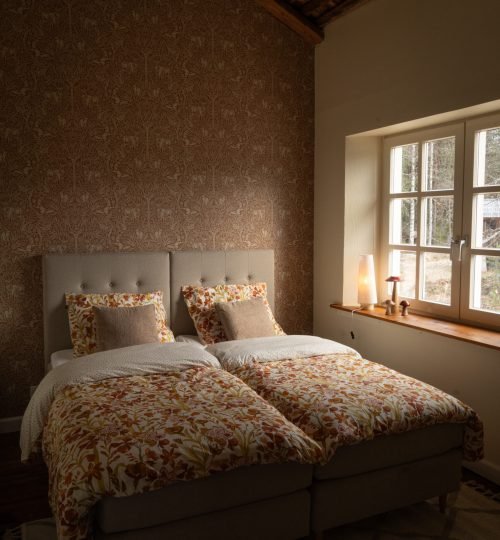 Bedroom inside the guesthouse at InnerTrail Sweden